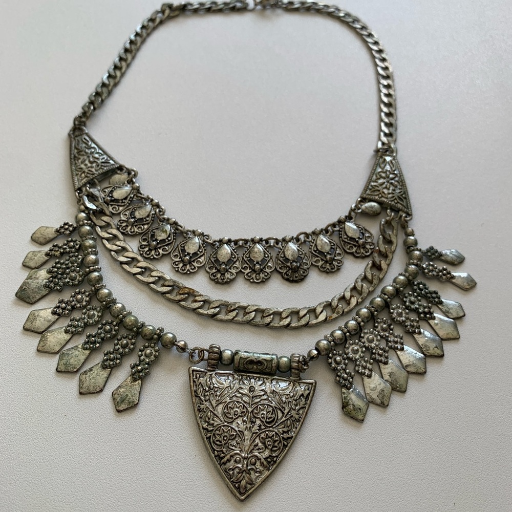 Nefertiti’s Treasures Silver Tone Ornate 3 Tiered Bib Necklace & Shield Pendant